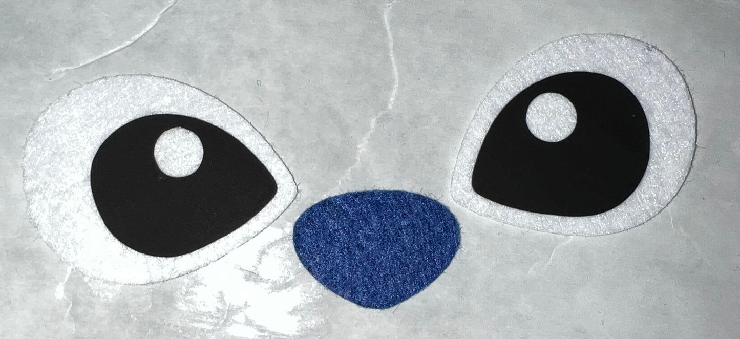 Big blue and pink alien eyes. Not baby Alien